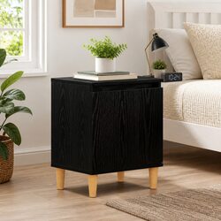 Compact Black Oak Bedside Cabinet with Hinged Door
