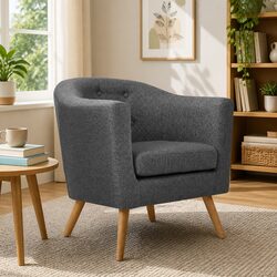 Grey Upholstered Armchair with Tufted Back and Wooden Legs
